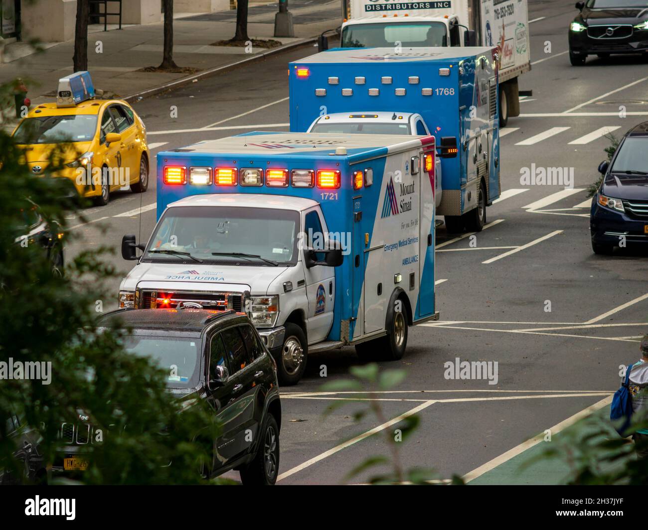 Mt. Sinai ambulances, part of the New York City 911 system, parked in the Chelsea neighborhood of New York on Tuesday, May 5, 2021. (© Richard B. Levine) Stock Photo