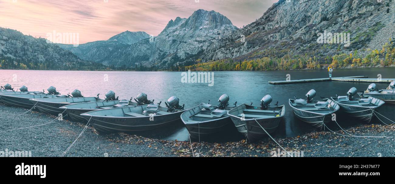 Boats dock along the Silver Lake at early morning, with the view of Carson Peak in background, June Lake Loop, Mono County, California, United States, Stock Photo