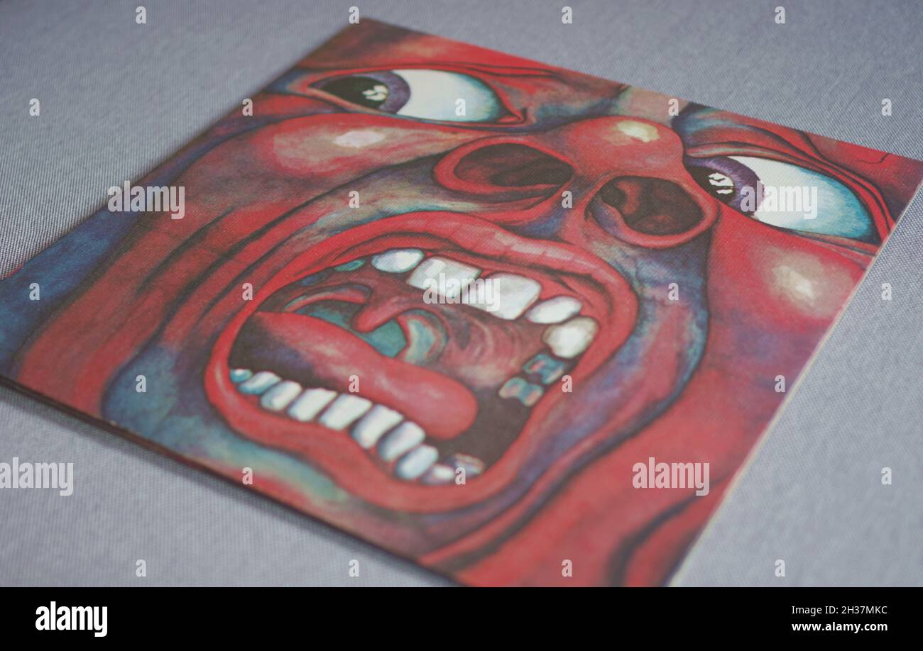 King Crimson 1969 debut album In the Court of the Crimson King vinyl LP paper sleeve cover 21st Century Schizoid Man face Stock Photo