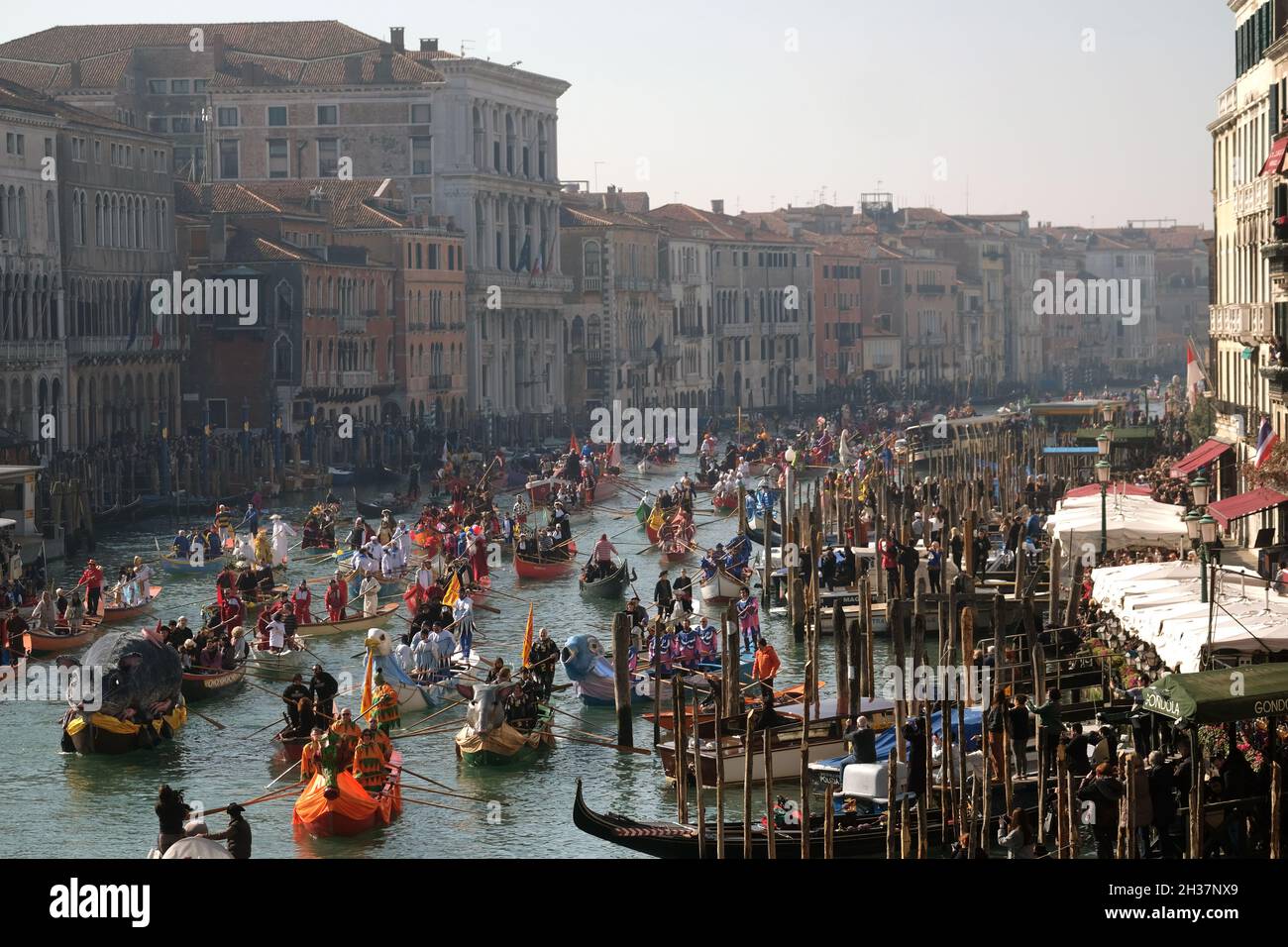 Venetians row during the masquerade parade on the Cannaregio Canal during the Carnival in Venice, Italy February 17, 2019. Stock Photo
