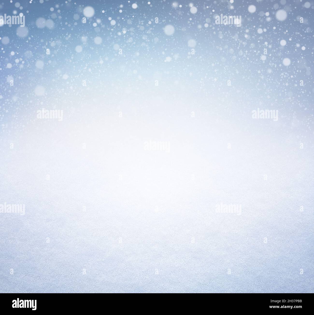 Snowfall and snowflakes on a white winter snow background. Christmas season material. Stock Photo