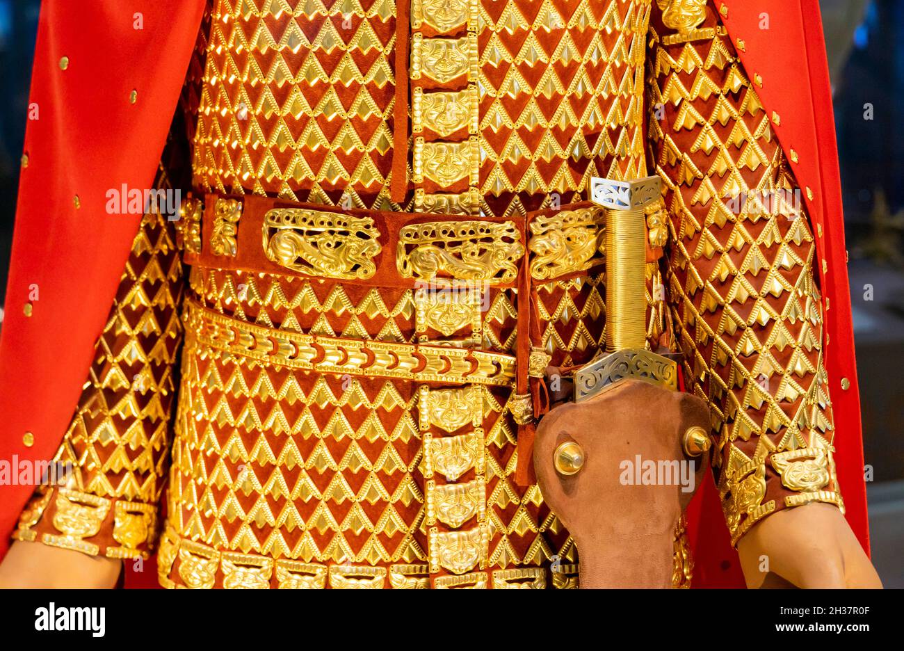 Body armor, sword of Golden Man; a noble Saka warrior of V-IV century BC. Costume and equipment reconstruction, Museum in Nur-Sultan, Kazakhstan Stock Photo