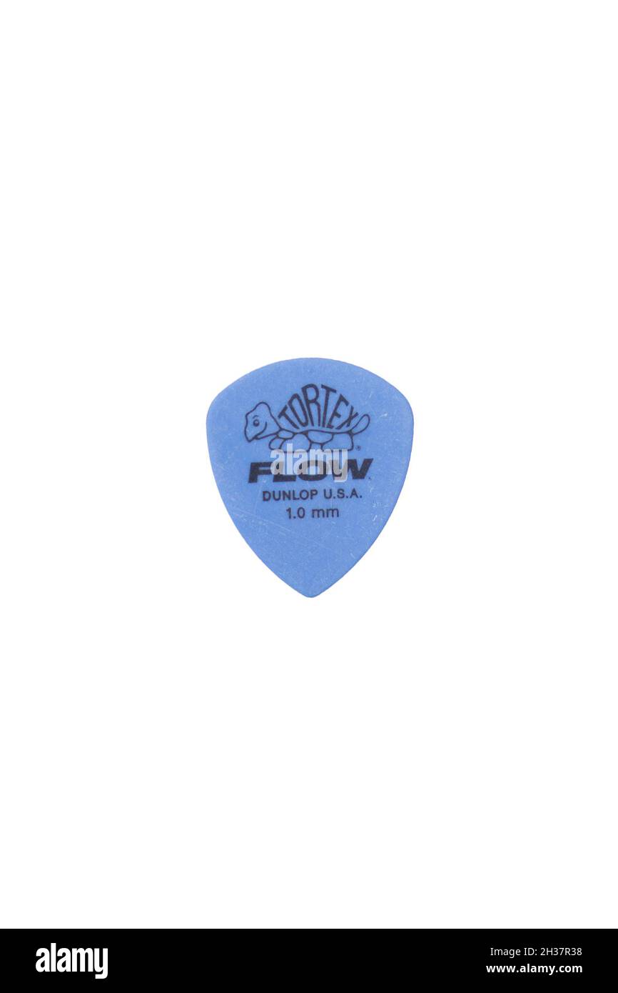new guitar picks on white background Stock Photo - Alamy