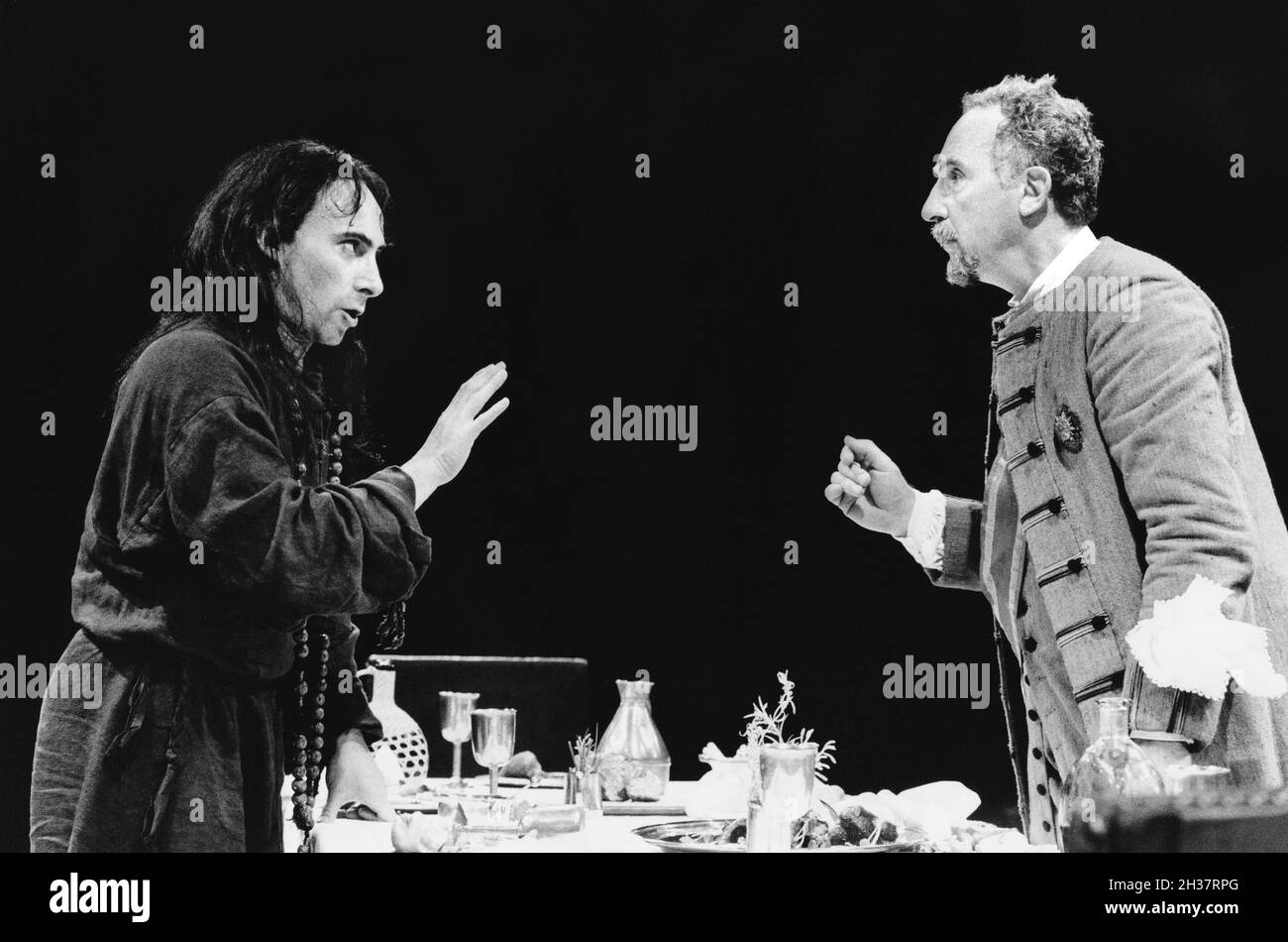 l-r: Antony Sher (Tartuffe), Nigel Hawthorne (Orgon) in TARTUFFE  by Moliere at the Royal Shakespeare Company (RSC), The Pit, Barbican Theatre, London EC2   28/07/1983  translated by Christopher Hampton  design: Alison Chitty  lighting: Leo Leibovici  director: Bill Alexander Stock Photo