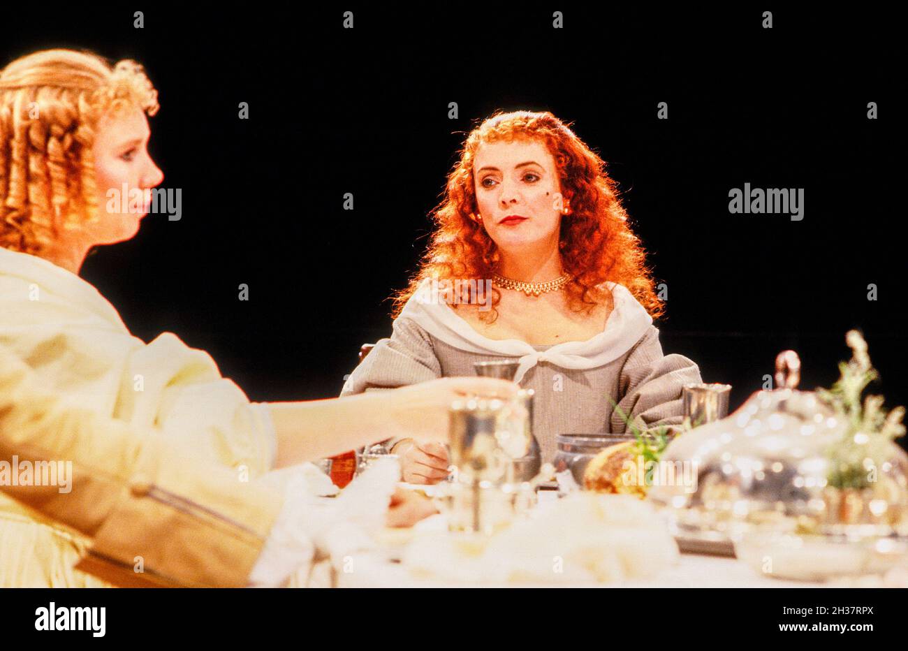 l-r: Katy Behean (Mariane), Alison Steadman (Elmire) in TARTUFFE  by Moliere at the Royal Shakespeare Company (RSC), The Pit, Barbican Theatre, London EC2   28/07/1983  translated by Christopher Hampton  design: Alison Chitty  lighting: Leo Leibovici  director: Bill Alexander Stock Photo