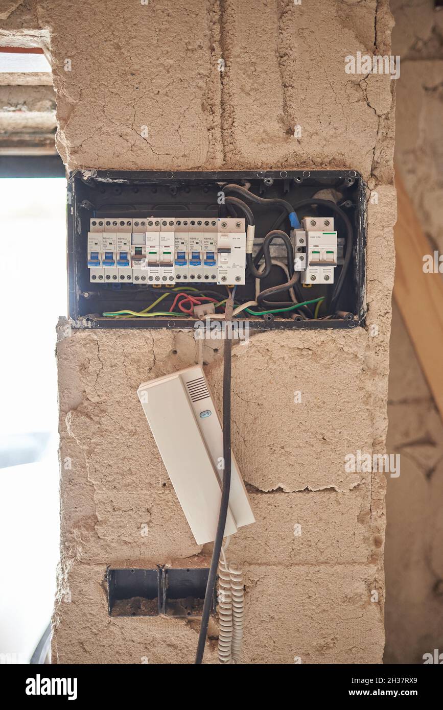 Electricity distribution box in the apartment under construction Stock Photo