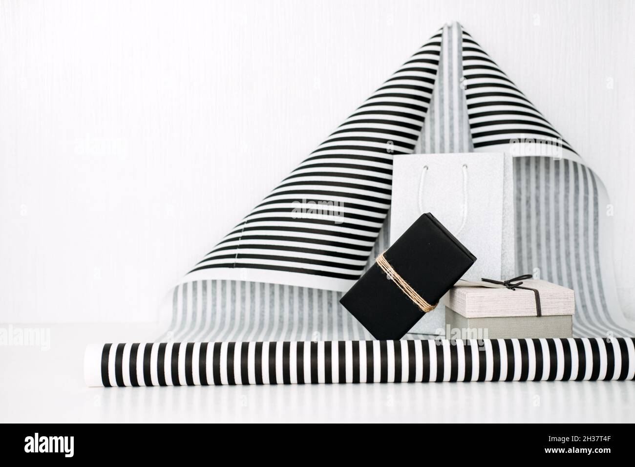 Black and white striped gift wrap background. Modern holiday gift