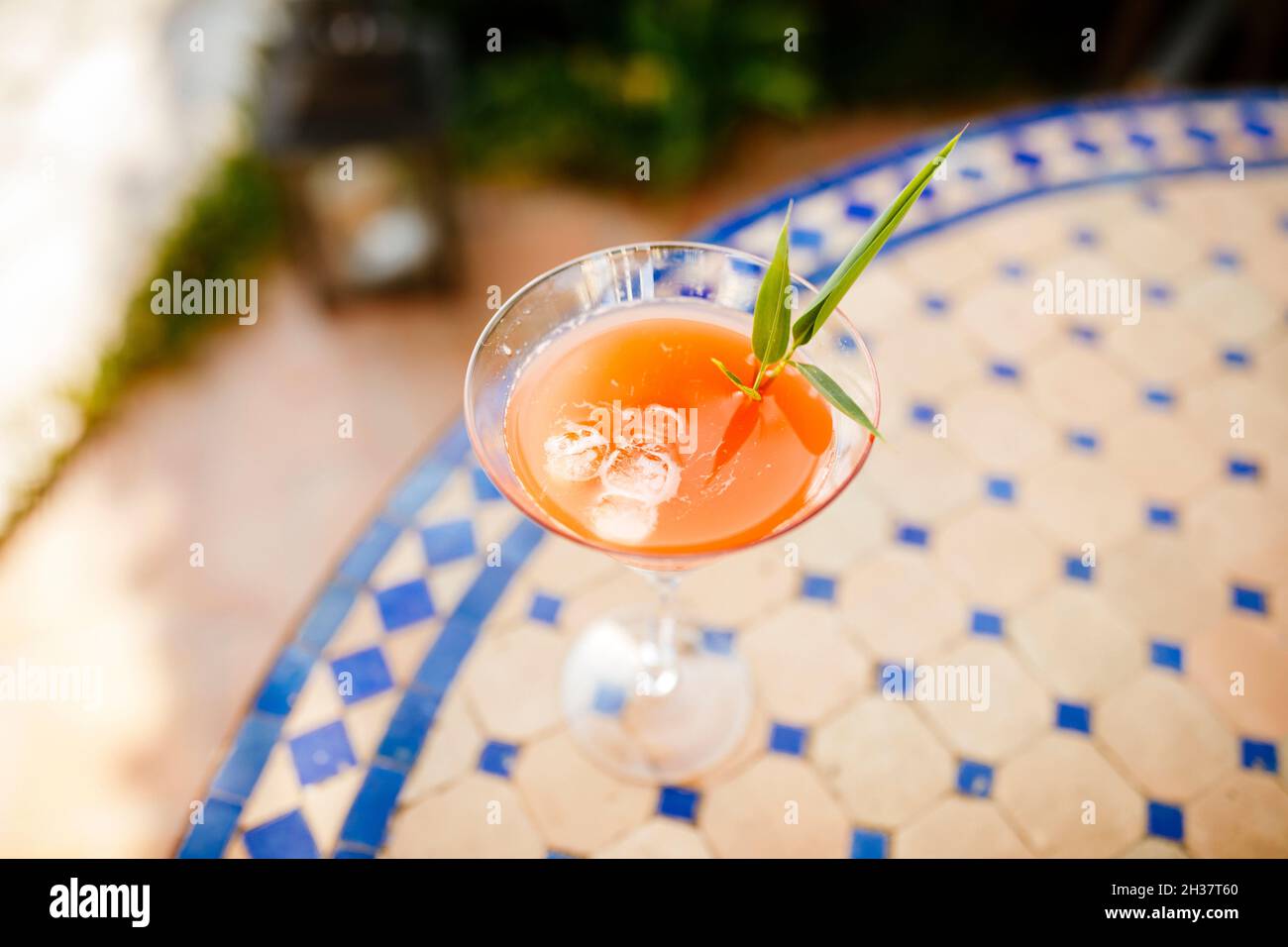 Aperol Spritz glass cocktail in a tropical setting Stock Photo