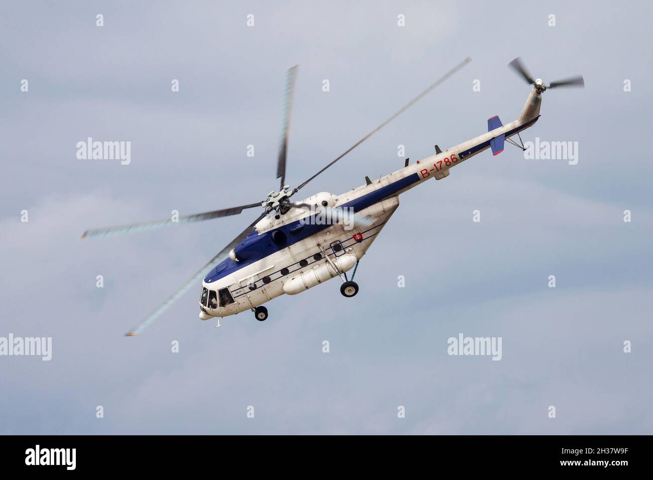 Sliac, Slovakia - August 30, 2014: Government police helicopter at airport. Aviation and aircraft. Commercial and general aviation. Aviation industry. Stock Photo