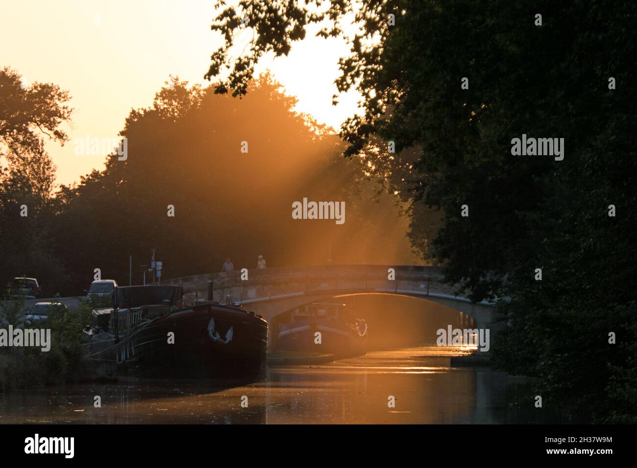 Sunset view of boats on the Canal du Midi in the department of Aude, region of Occitanie, southern France Stock Photo