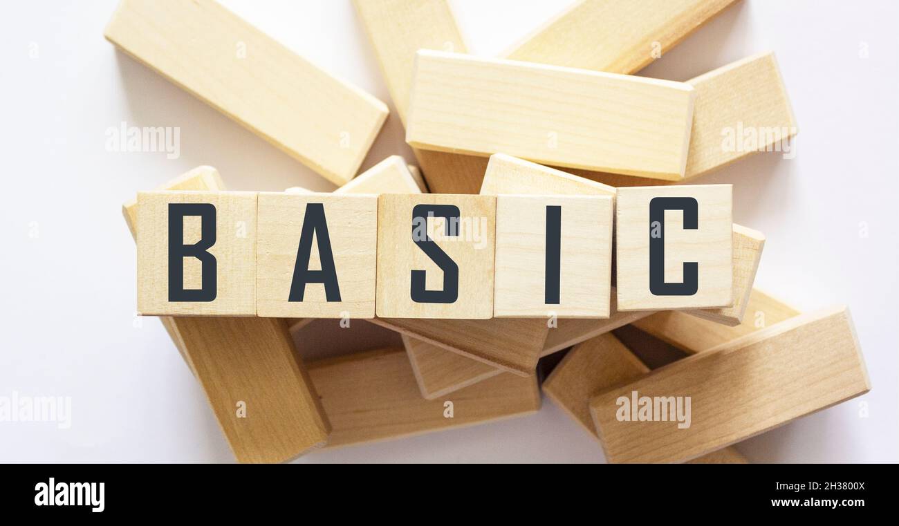 Wooden cubes with the word BASIC on a white background Stock Photo