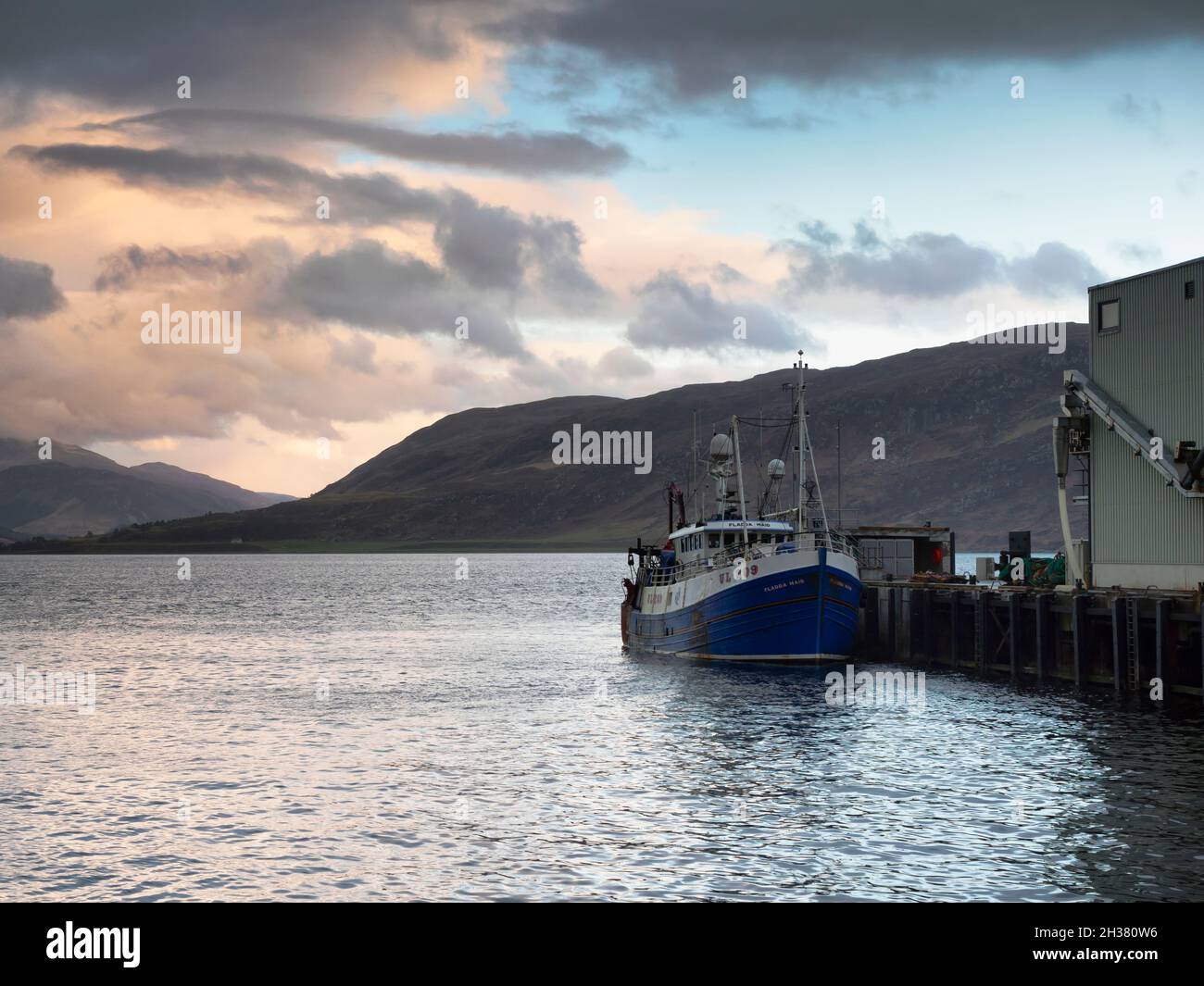 Sunset over Ullapool Harbour. Stock Photo