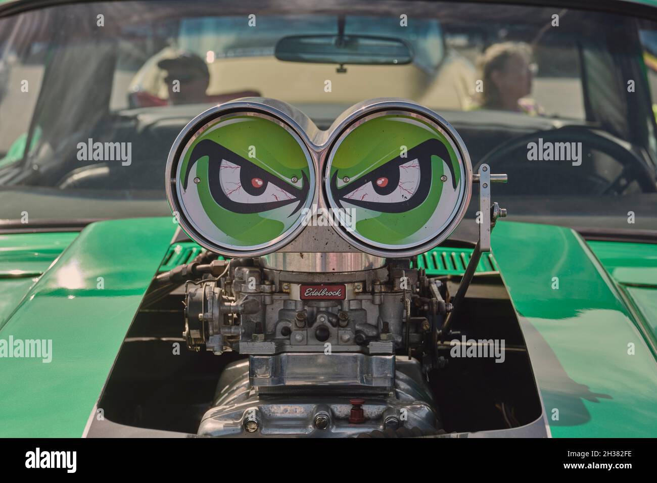 Custom car with green eyed Edelbrock blower intake on display at the 2021 Endless Summer Cruisin in Ocean City Maryland. Stock Photo