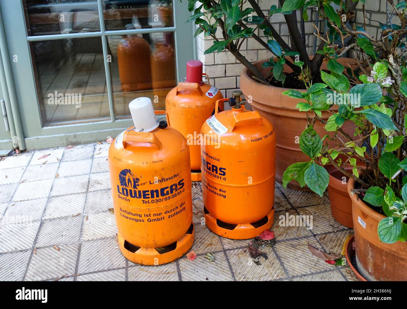 3 gas cylinder Propane in front of a restaurant, Berlin Stock Photo Alamy