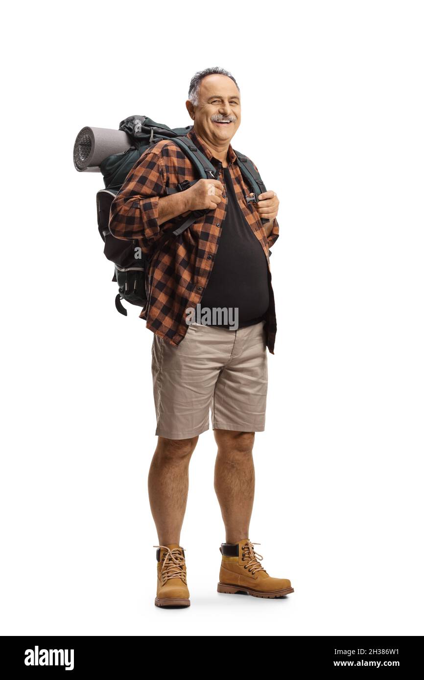 Full length portrait of a mature man with a backpack standing and ...