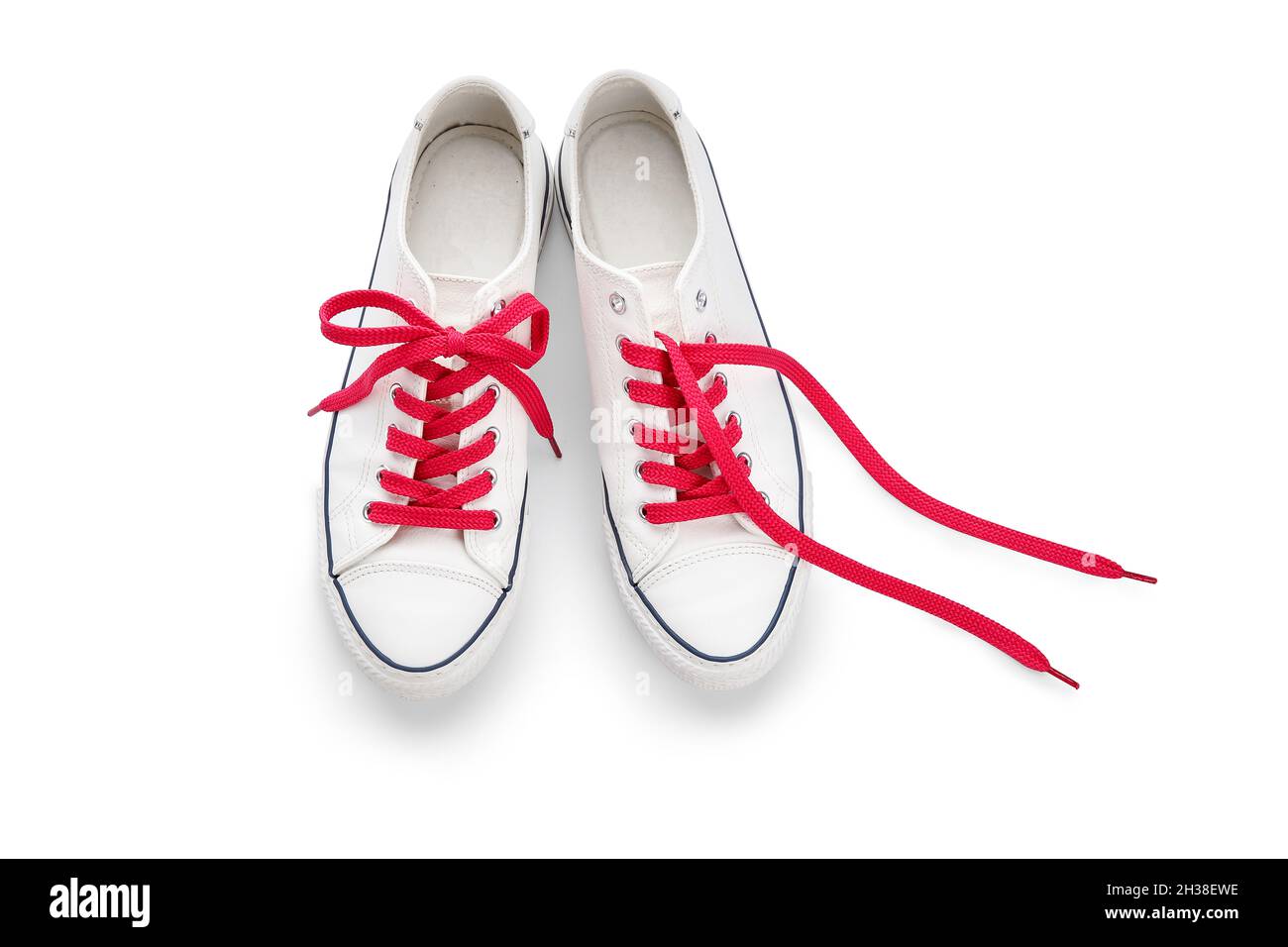 Stylish shoes with red laces isolated on white background Stock Photo