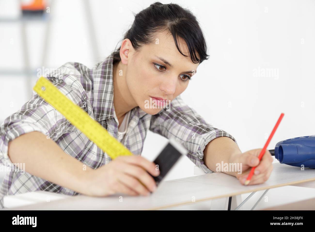 hardworking focused professional carpenter woman Stock Photo