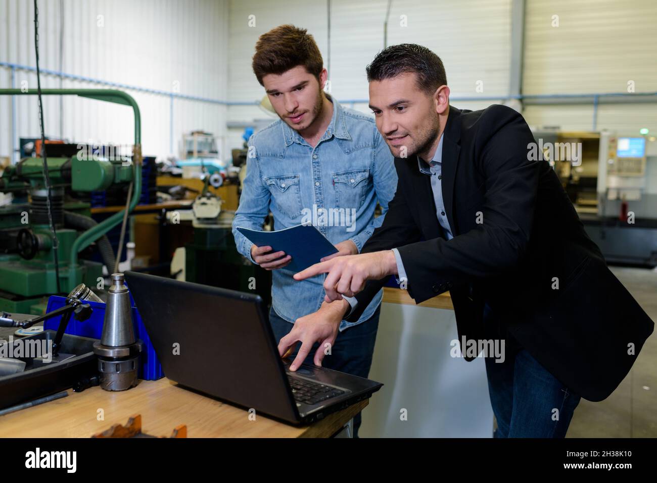 team of engineers with laptop Stock Photo