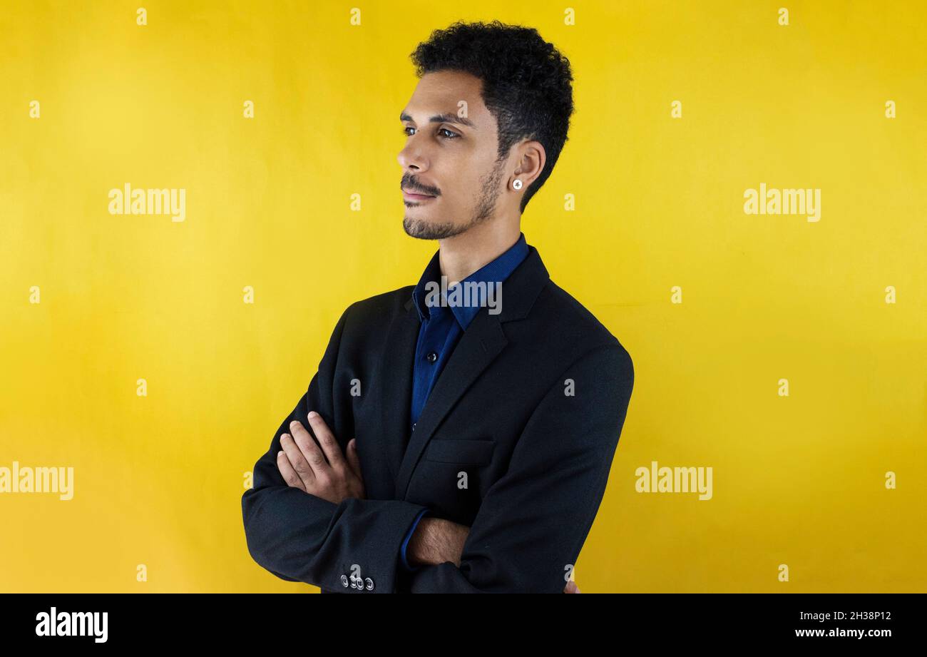 Business young man in a Suit isolated on yellow blackground. Handsome ...