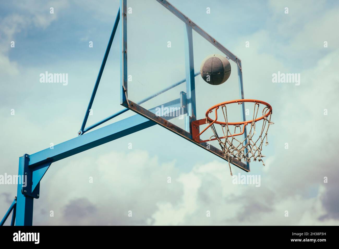 Ball in the air about to be hit in the basket Stock Photo - Alamy