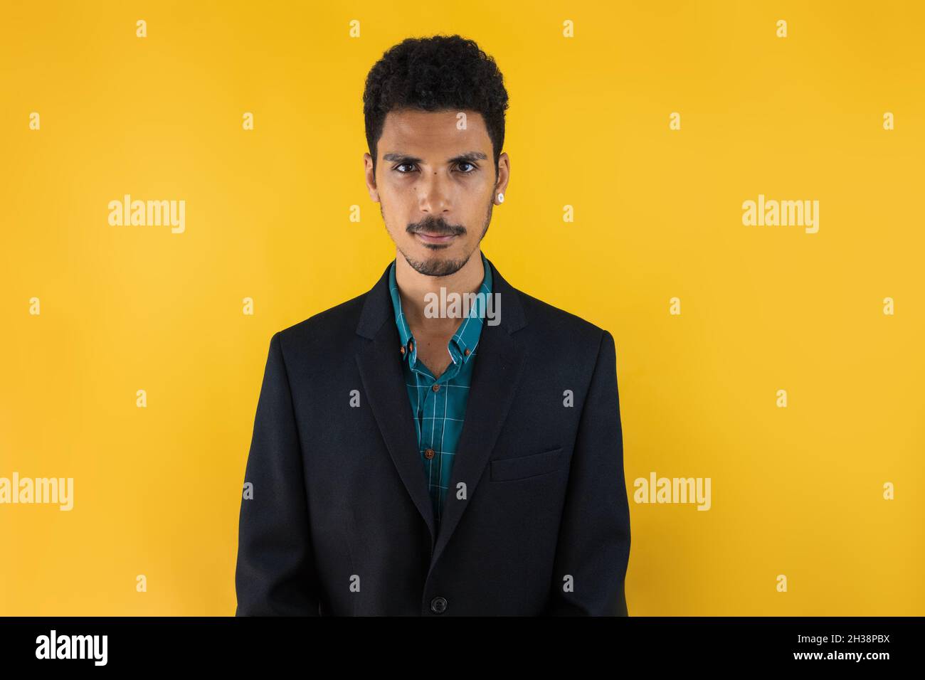 Business young man in a Suit isolated on yellow blackground. Handsome ...