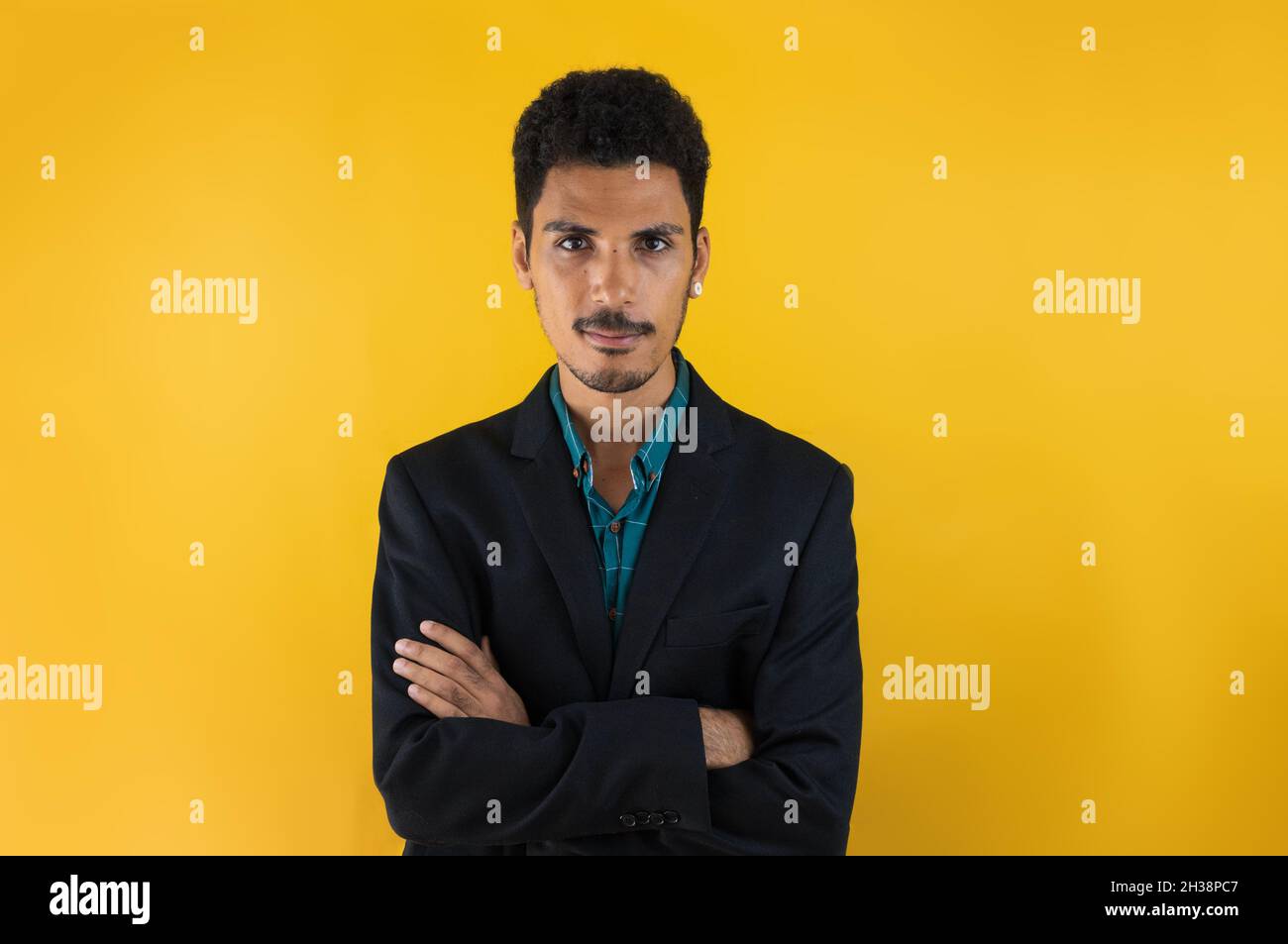 Business young man in a Suit isolated on yellow blackground. Handsome ...