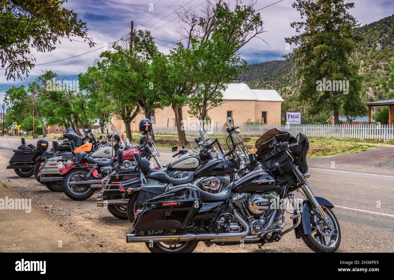 Lincoln, New Mexico Harley-Davidson motorcycles parked on Calle la Placita, main street. Stock Photo