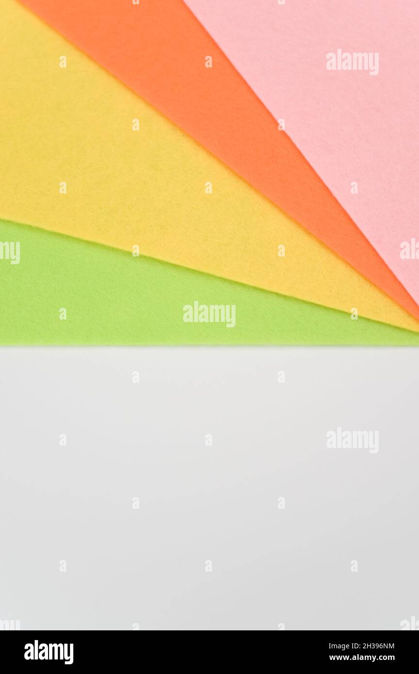 multicolored felt sheets backdrop on white background Stock Photo - Alamy