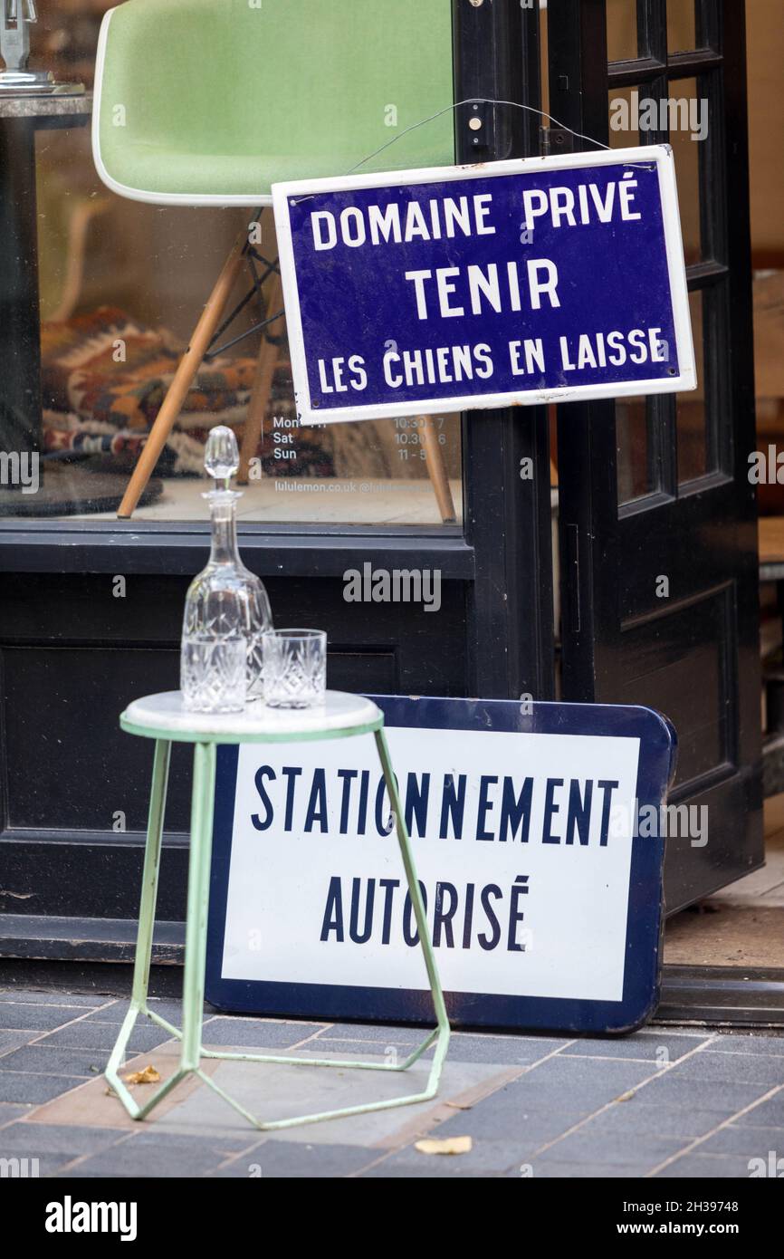 Signs in French outside a shop in Shoreditch, east London Stock Photo