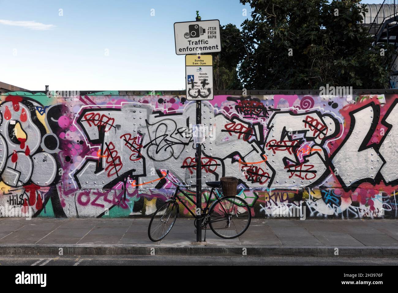 Graffitti on a street in Shoreditch, east London Stock Photo