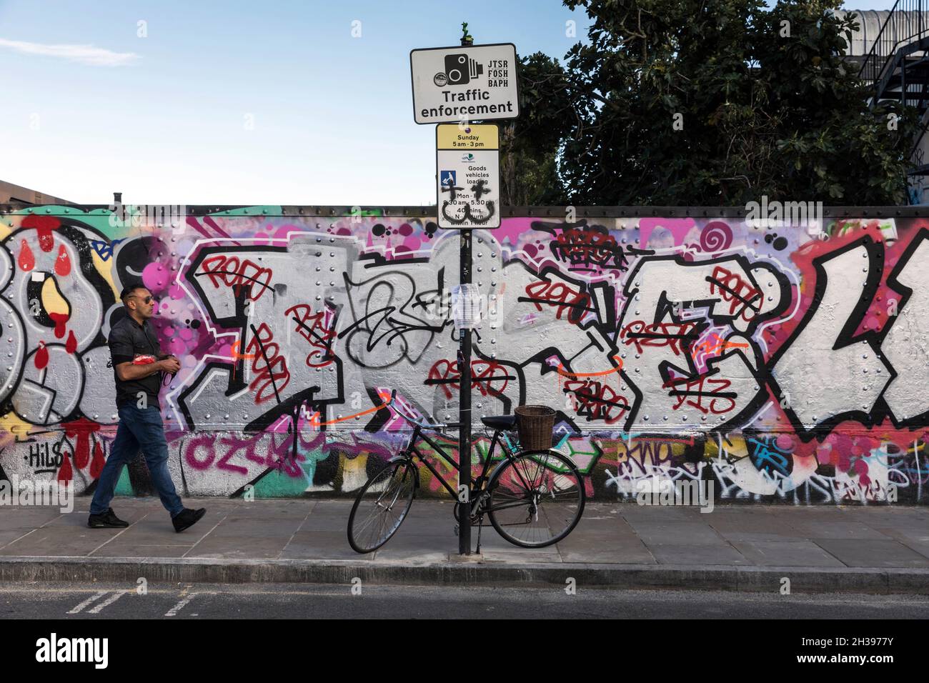 Graffitti on a street in Shoreditch, east London Stock Photo