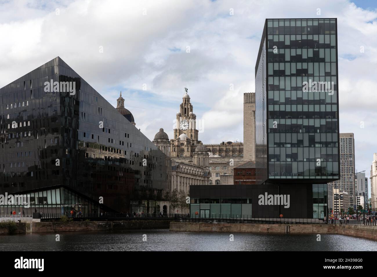 Old and new buildings at Pier Head, Liverpool, including the Three Graces Stock Photo