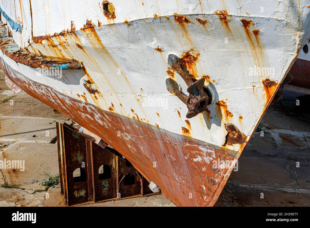 Large old iron rusting ship in dry dock, closeup Stock Photo - Alamy