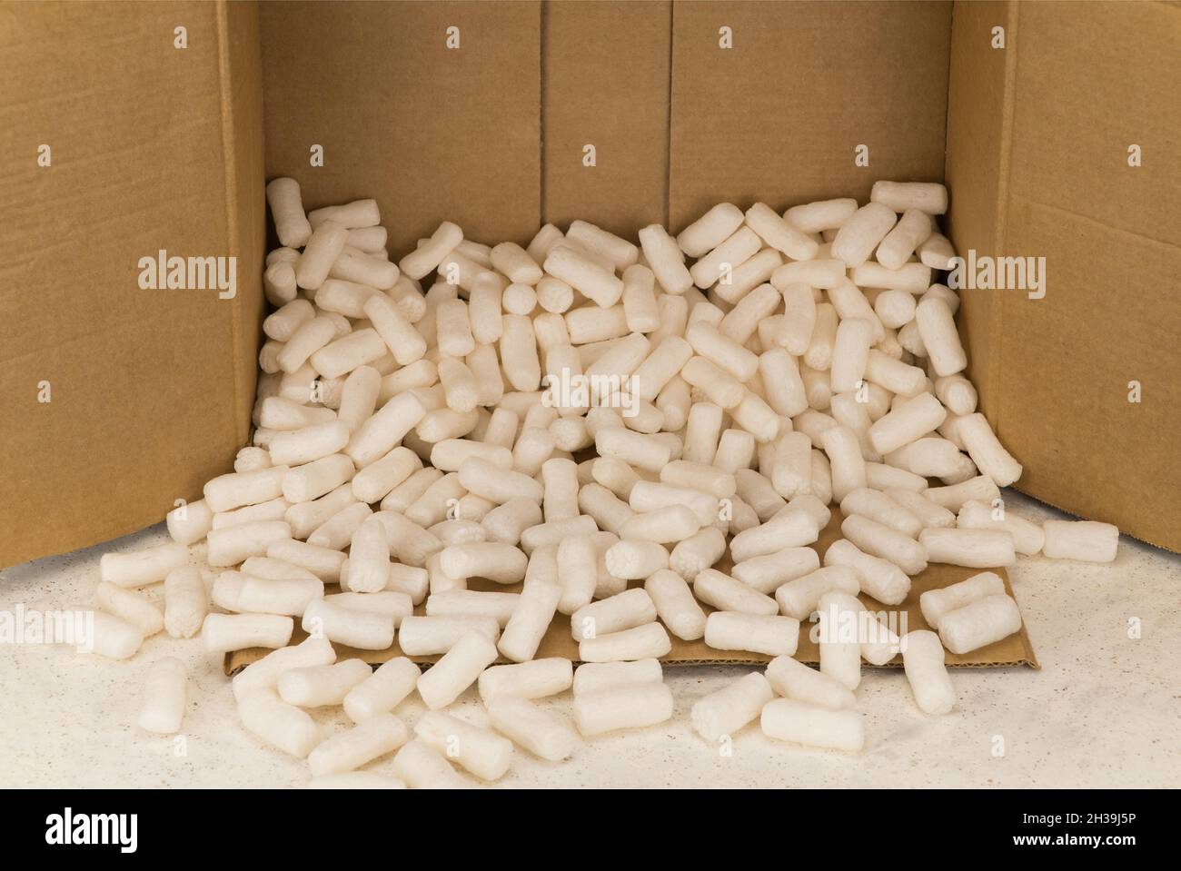 Empty cardboard box with styrofoam filler for safe packaging Stock