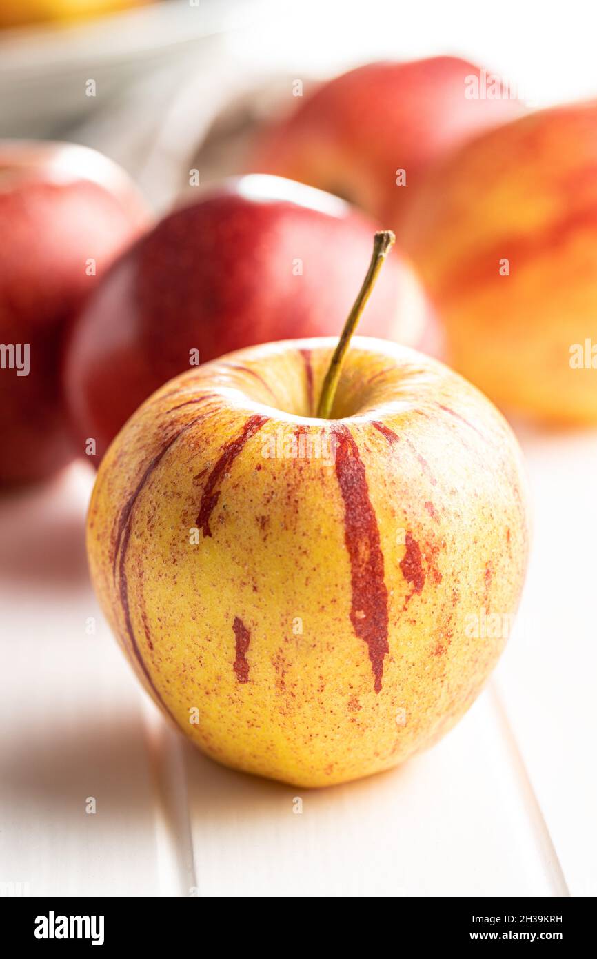 Fresh autumn apples on white table. Stock Photo