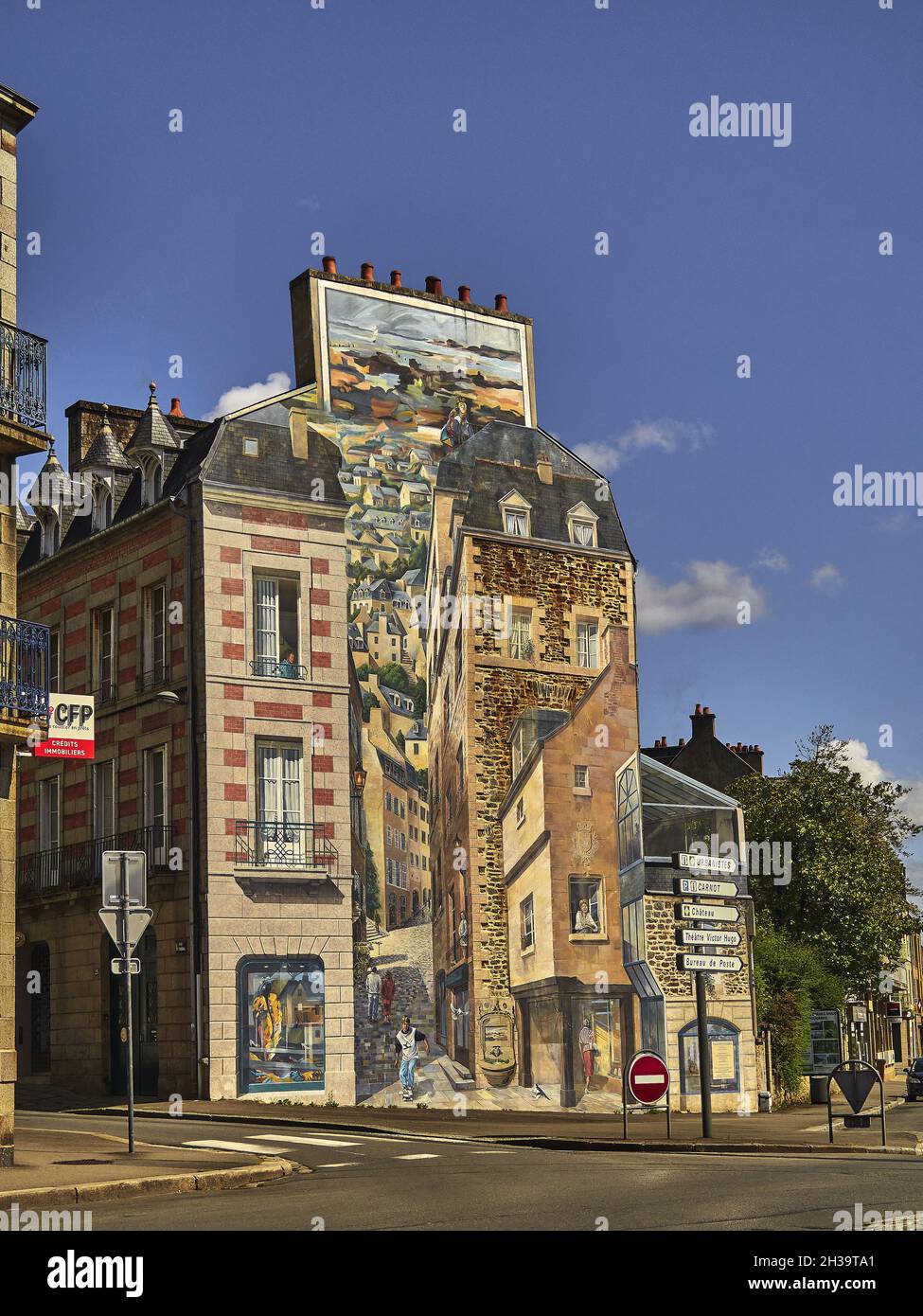 Fougeres city, FranceBrittany; Ille-et-Vilaine department. The small town is dotted with houses with trompe-l'oeil walls or urban frescoes like here. Stock Photo