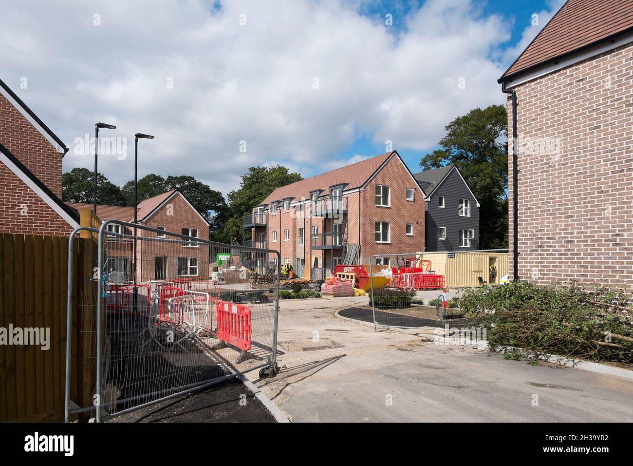 Builders finishing the flats, houses and roads at Keepers Green, the
