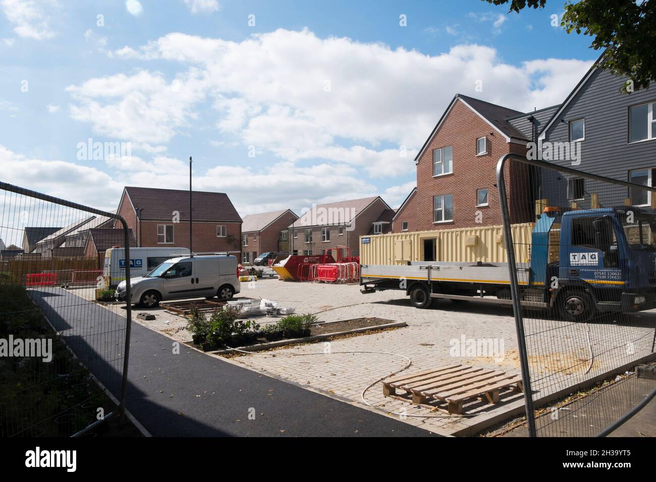 Builders finishing the flats, houses and roads at Keepers Green, the