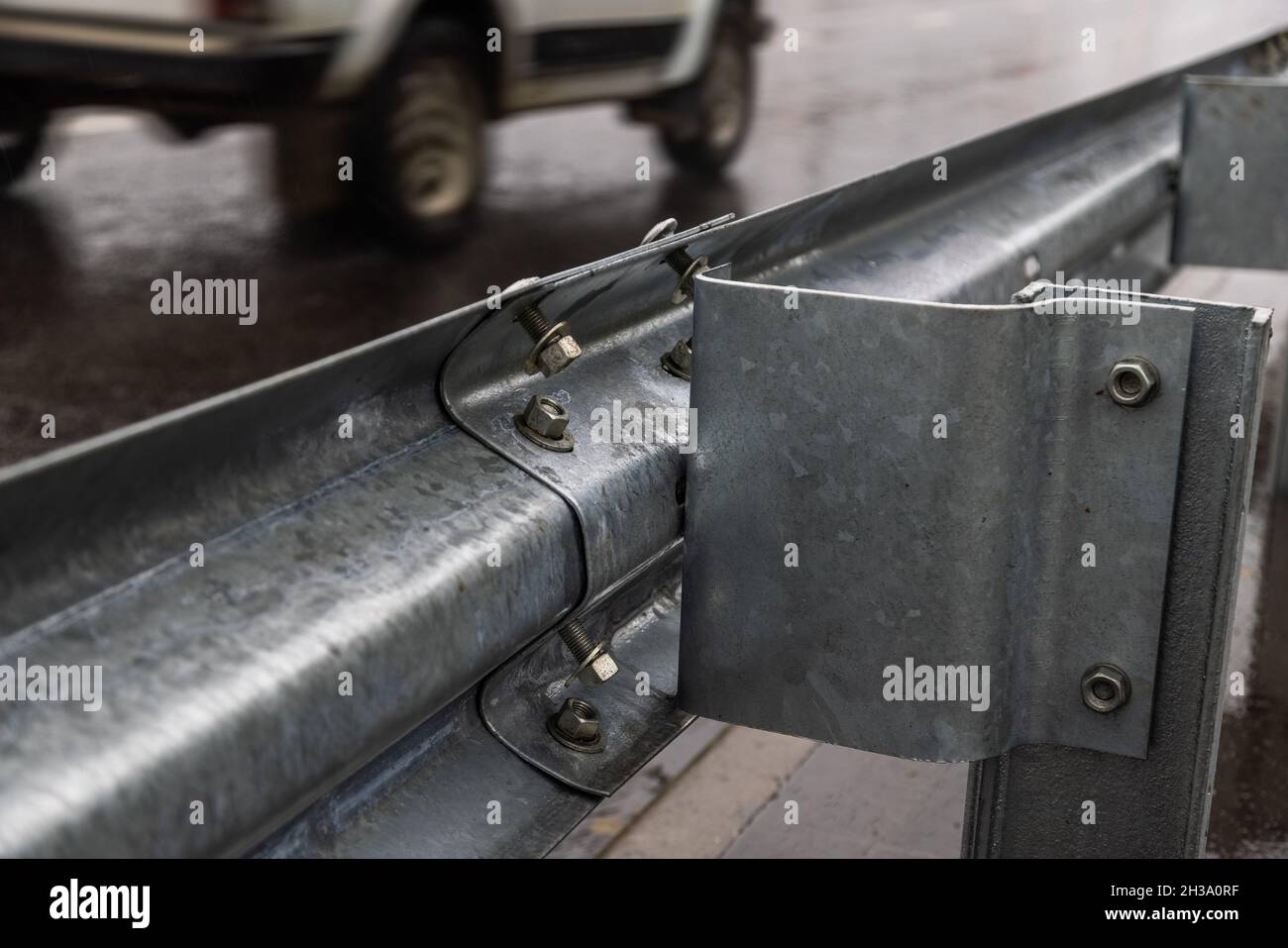 underscrewed nuts and bolts in highway road railing Stock Photo Alamy