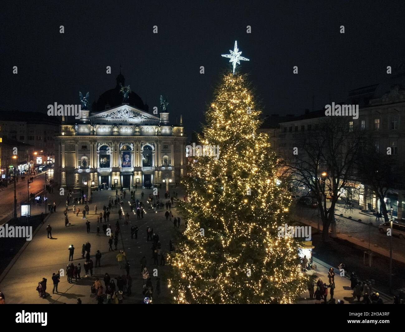 Lviv, Ukraine - January 3, 2021: overhead view of people walking by christmas fair copy space Stock Photo