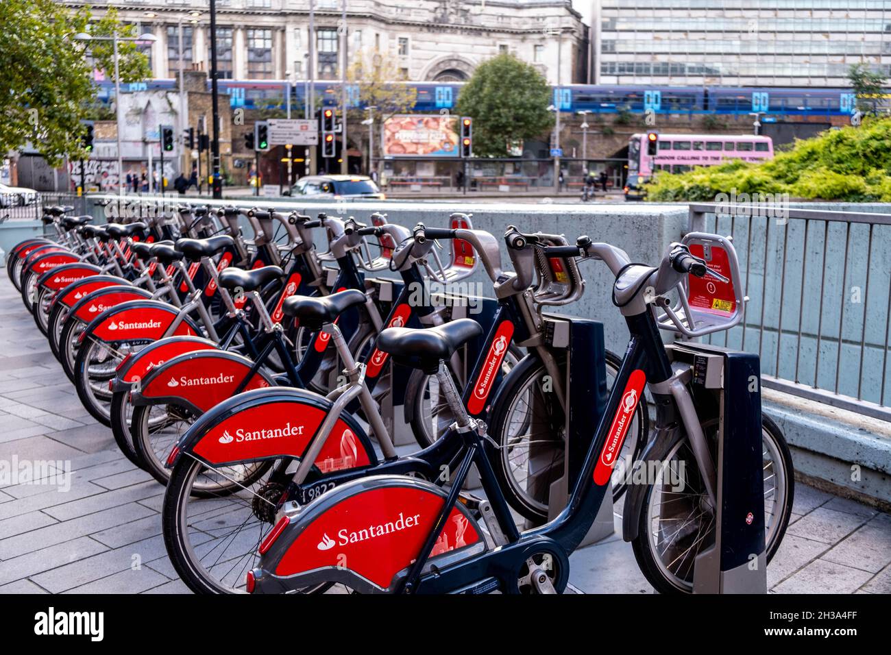 A Row Of Parked Santander Sposored Environmentally Friendly Push Bikes Or Bicycles In Waterloo Central London With No People Stock Photo