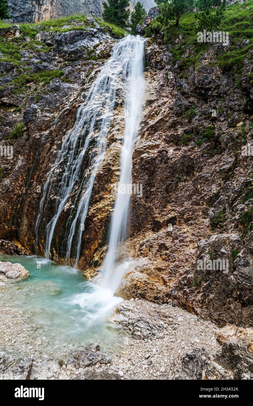Smaller waterfall in Val Lasties valley in Sella mountain group in Dolomites mountains in Italy Stock Photo