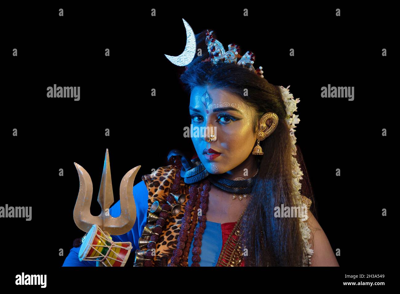 Indian female model in Ardhanarishvara makeup costume, a composite  male-female figure of the Hindu god Shiva together with his consort Parvati  Stock Photo - Alamy