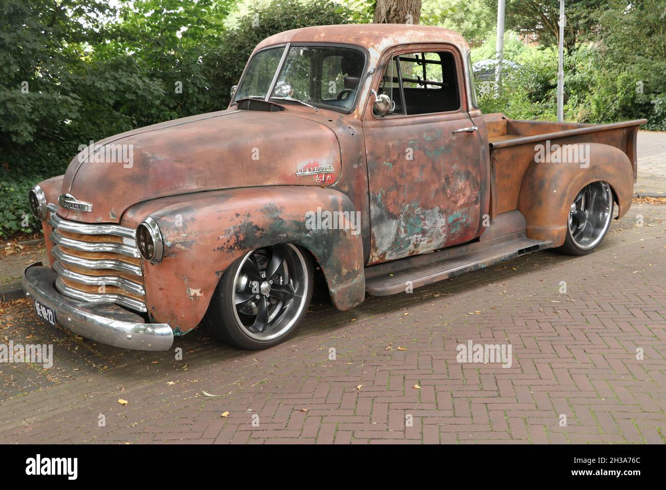 classic Chevrolet 3100 pick-up truck in rusty rat look Stock Photo