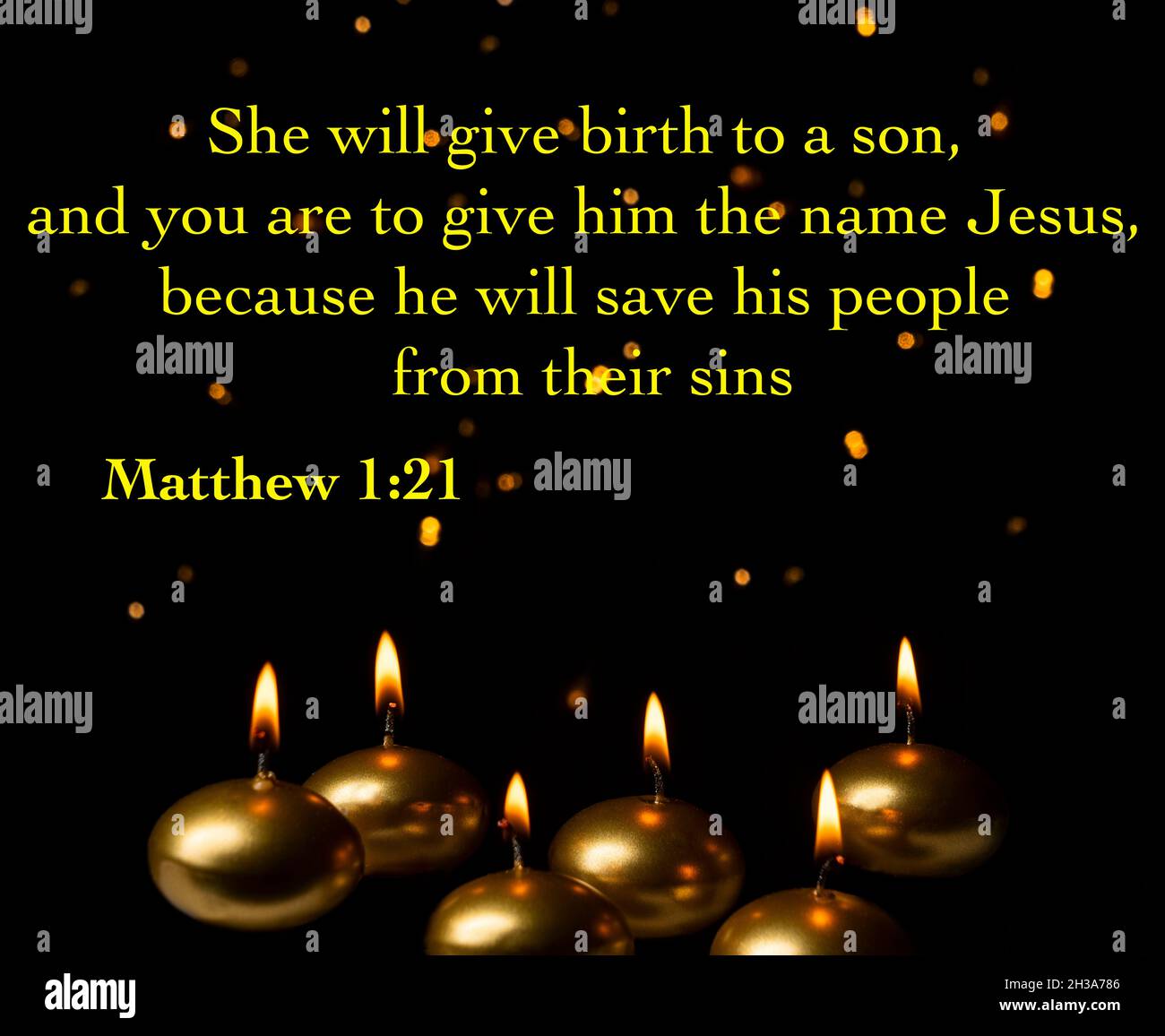 christmas bible verse with candles lit and Christmas lights on the