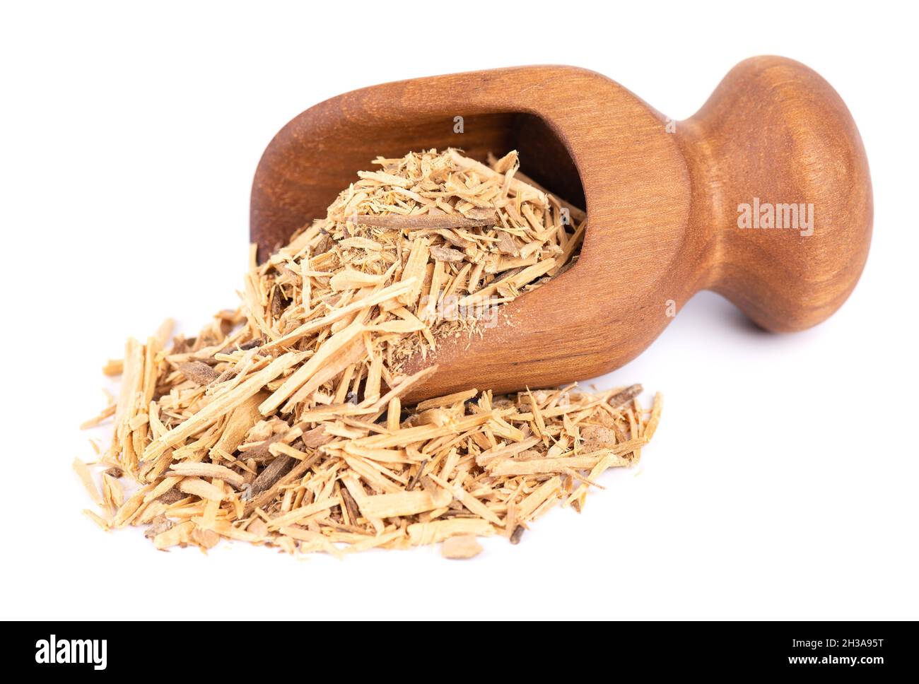 Muira Puama herbal tea in wooden scoop, isolated on white background. Natural potency wood