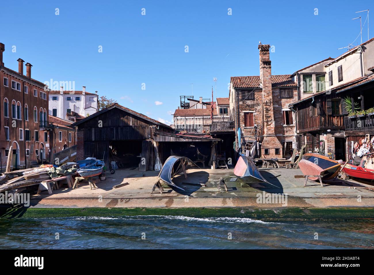 Venice, panoramic image of empty Squero di San Trovaso boatyard in Venice. Landmark boat yard building traditional wooden gondolas. Stock Photo