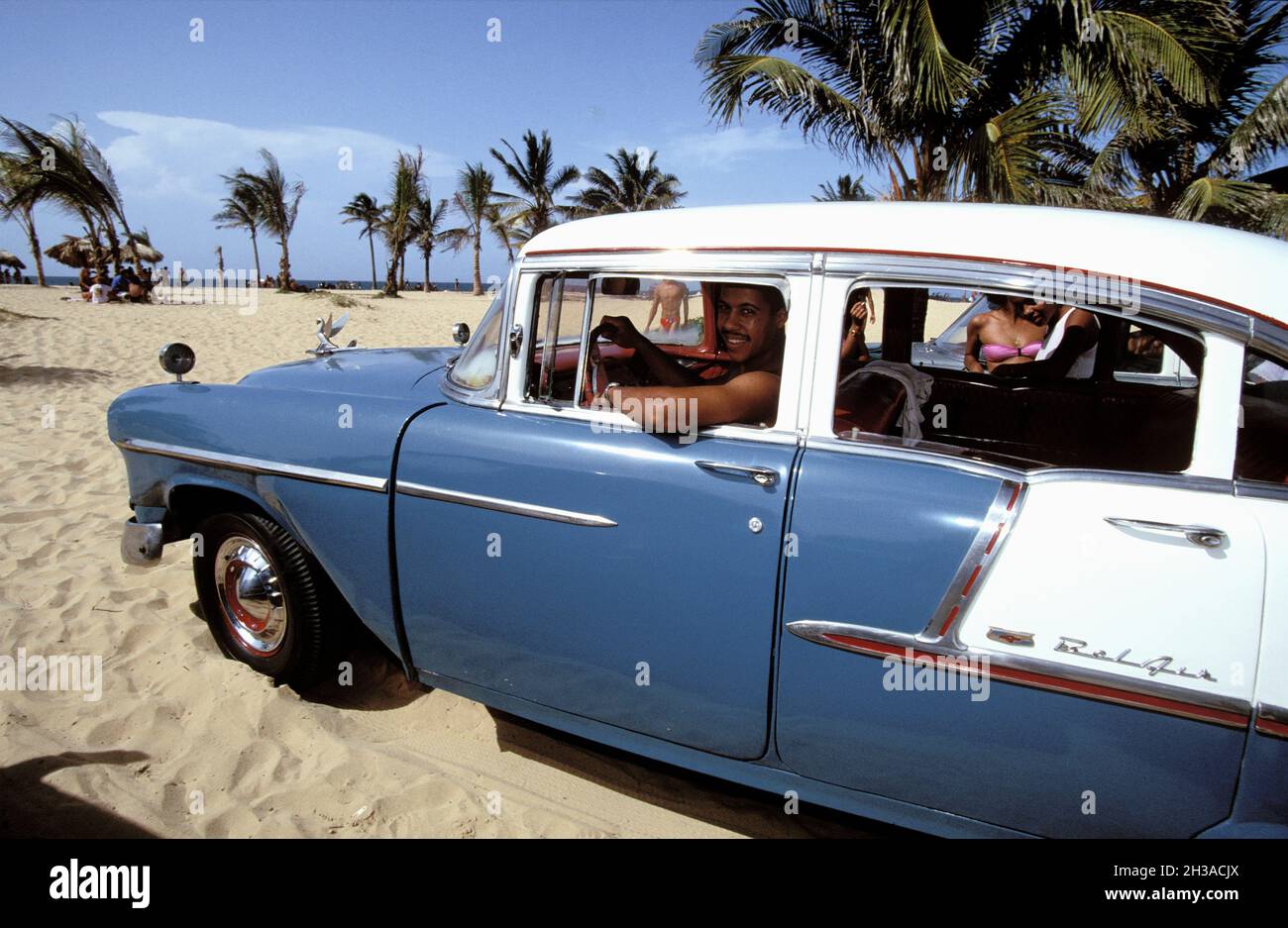 CUBA, HAVANA, OLD AMERICAN CAR ON THE PLAYA DEL ESTE Stock Photo