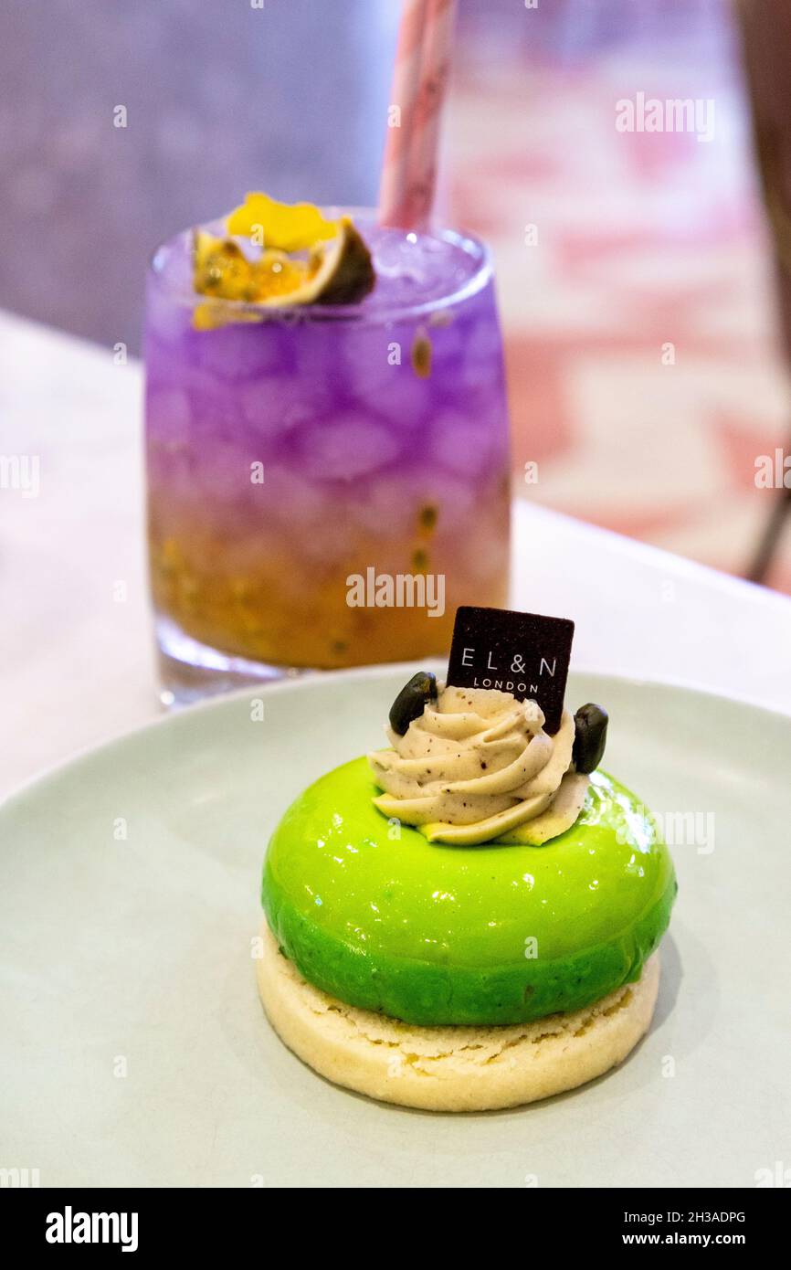Ombre Passion Fruit Cooler and Pistachio Rose Creme at EL&N Cafe Brompton Road, London, UK Stock Photo