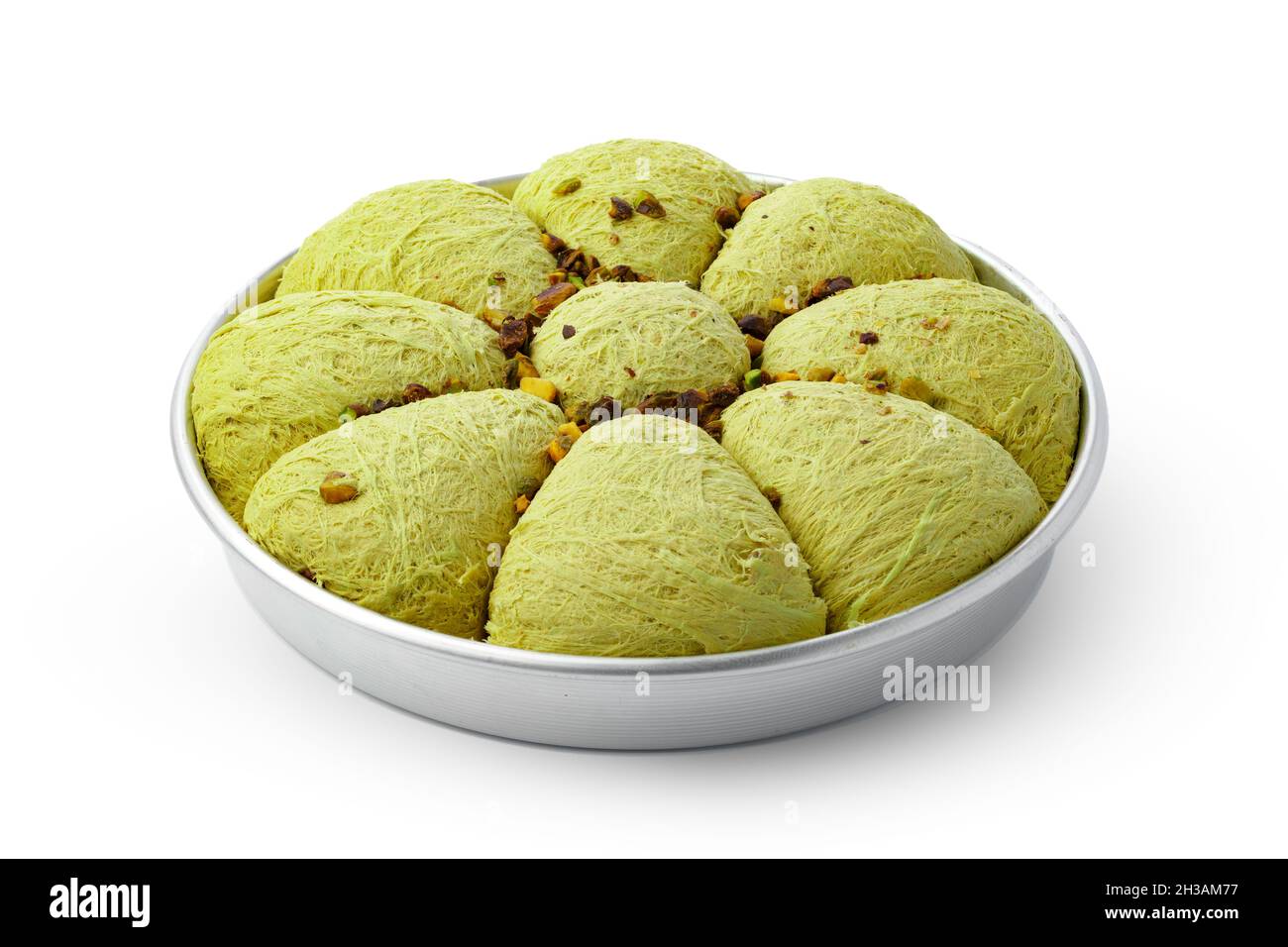 Turkish dessert halva in metal tray isolated on white Stock Photo Alamy